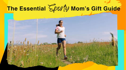 Woman running on a trail outdoors with wildflowers blooming all around