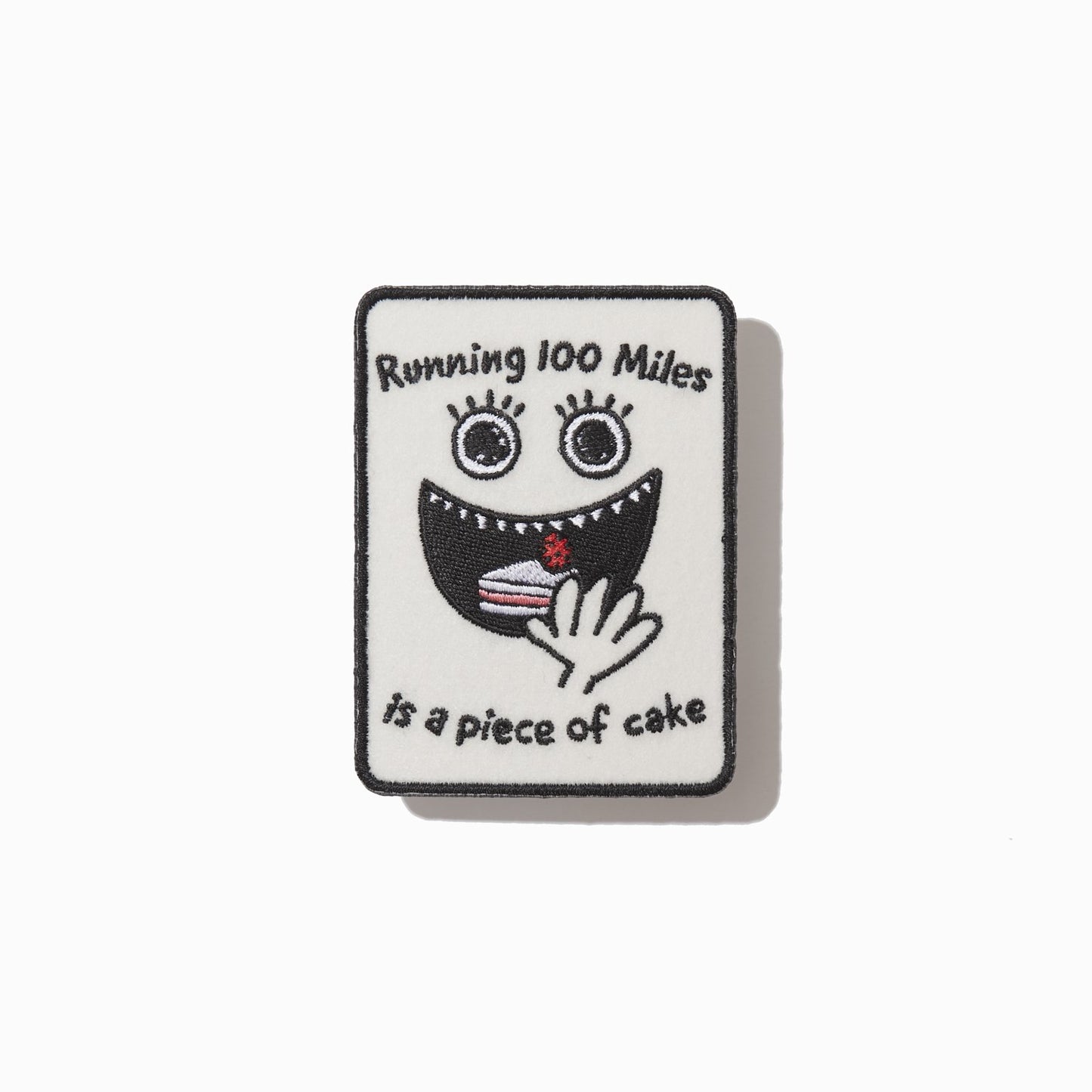 Tomo's Pit - Running 100 Miles is a Piece of Cake - Sticker/Cloth Patch Set